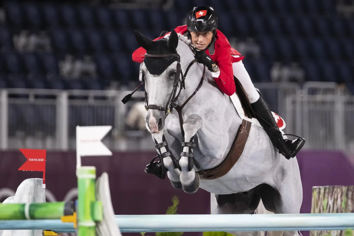 Der letzte Einsatz: Martin Fuchs mit Clooney im olympischen Teamspringen in Tokio.
