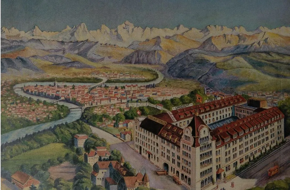 Ein altes Gemälde von Bern. Im Vordergrund ist eine Schokoladenfabrik zu sehen. 