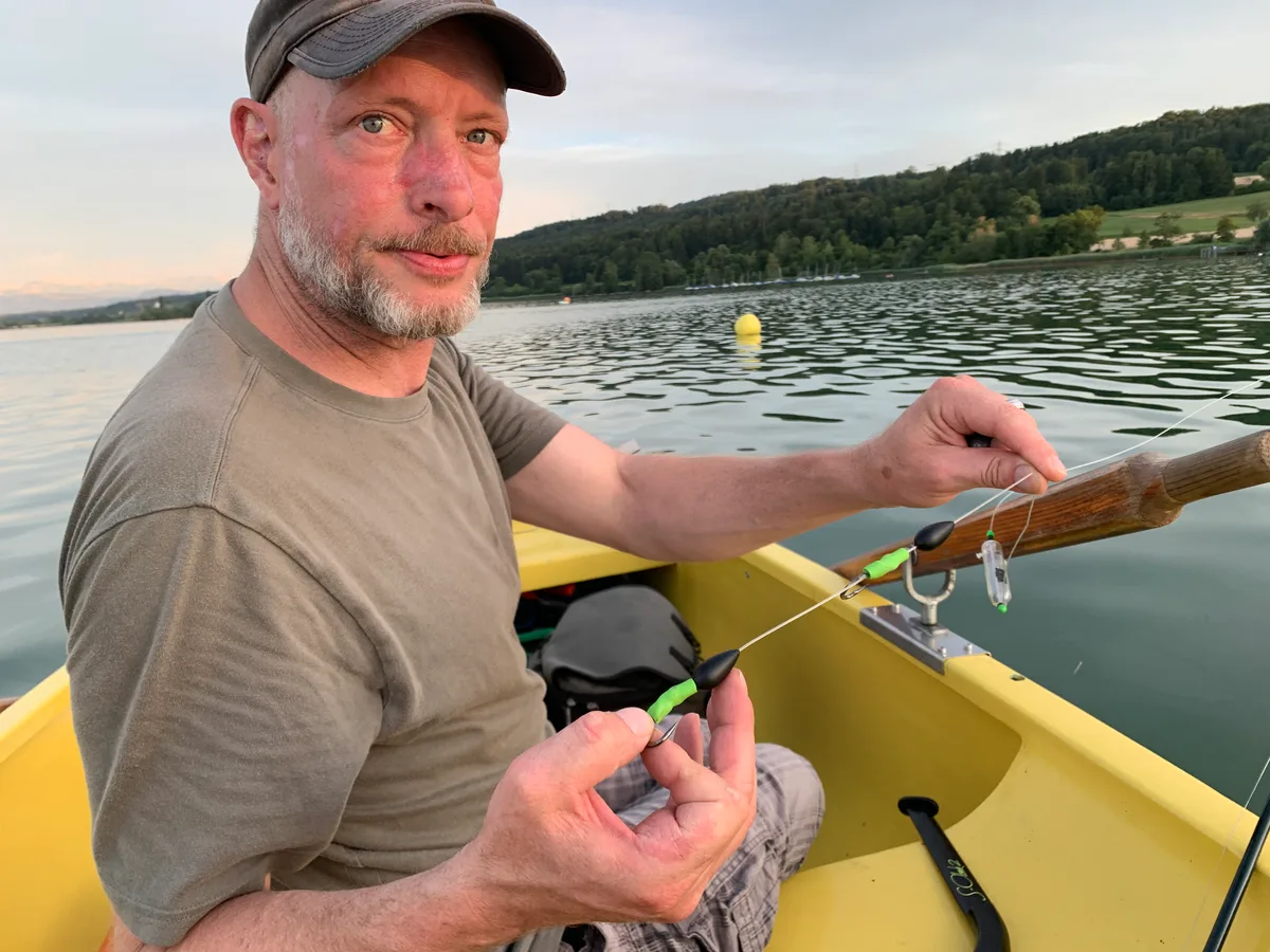 Mit zwei Fischern auf dem Greifensee.