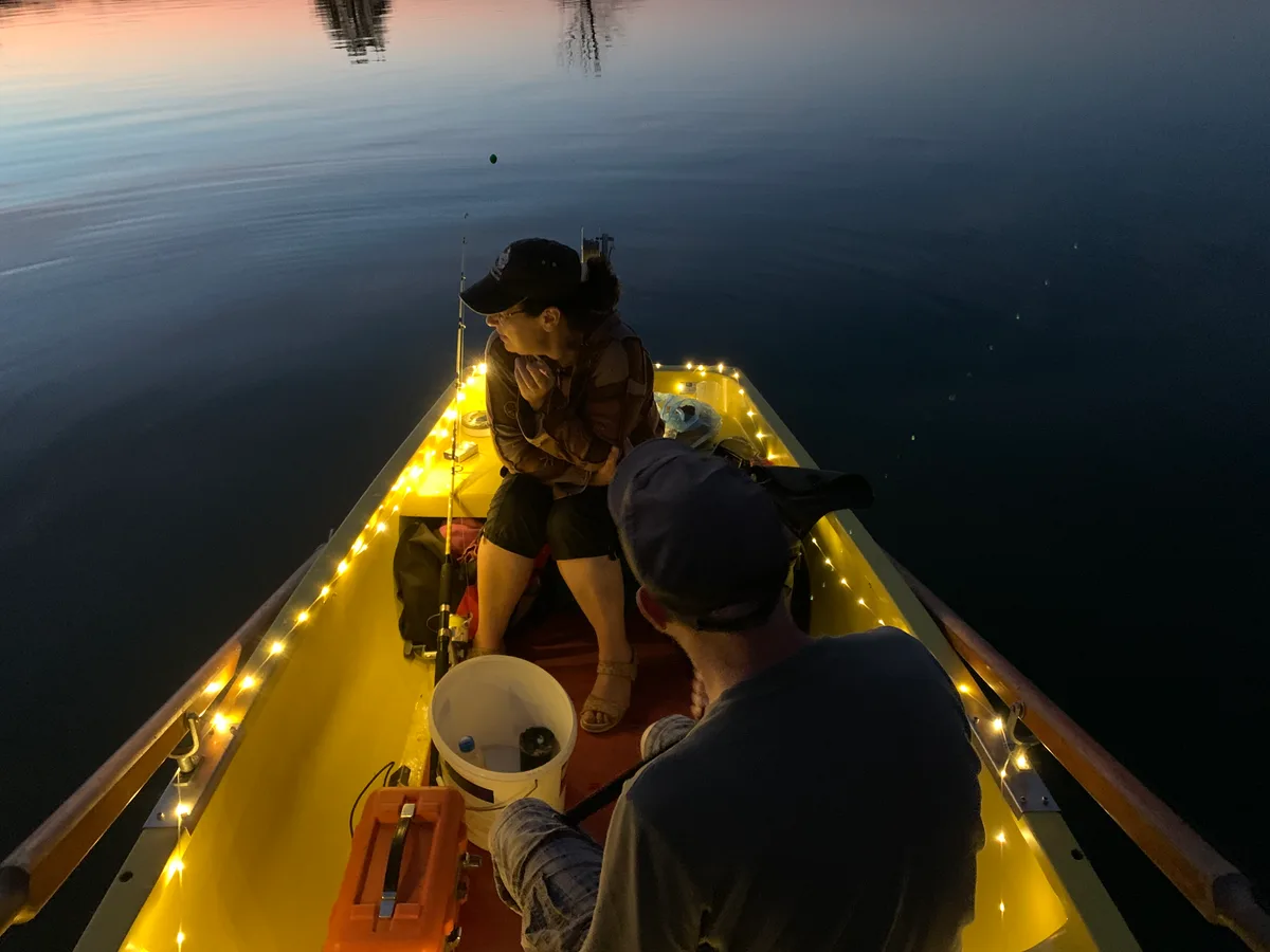Mit zwei Fischern auf dem Greifensee.