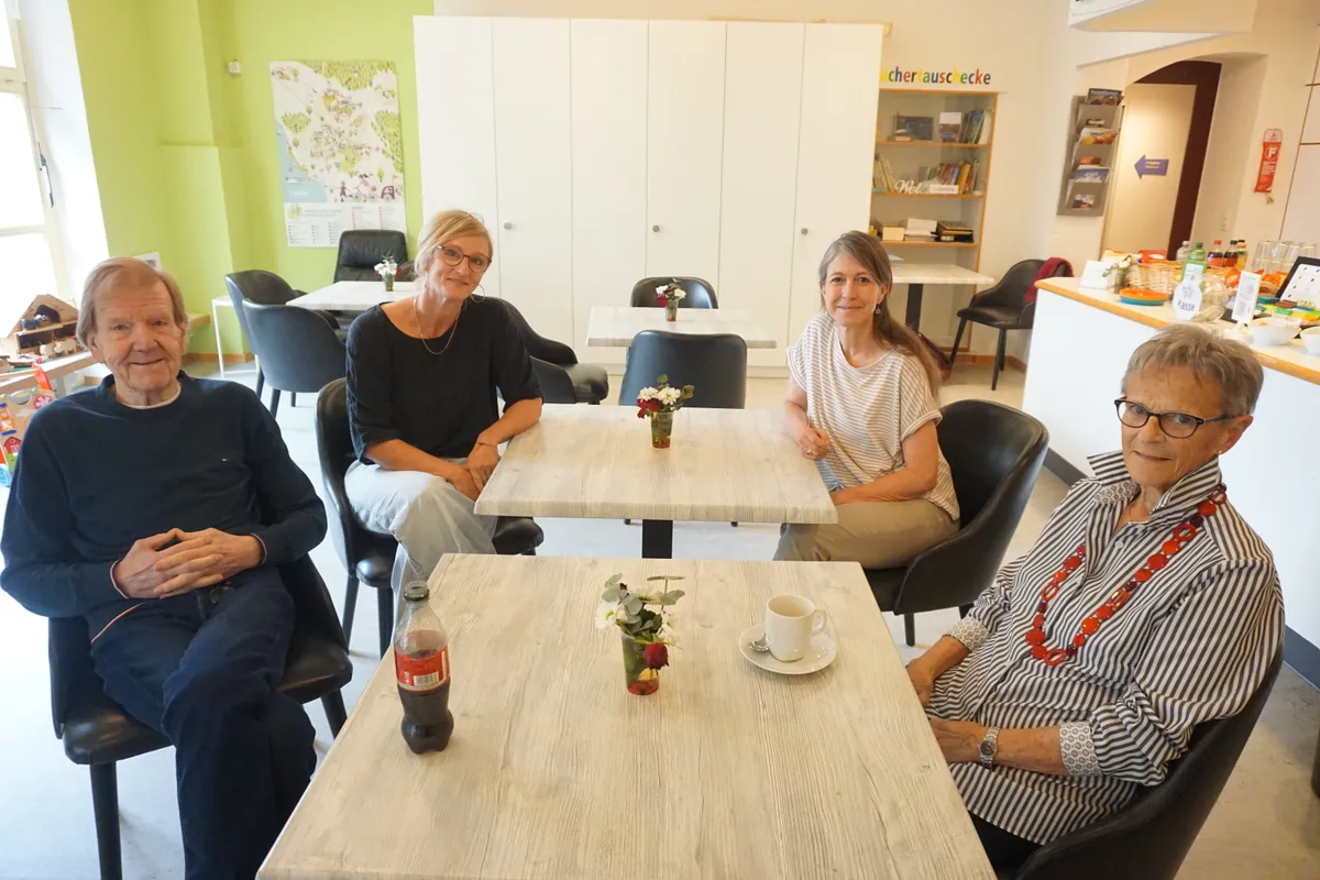 Leute am Tisch