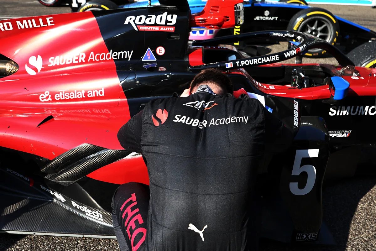 Theo Pourchaire (FRA) Alfa Romeo F1 Team Reserve Driver celebrates winning the F2 Championship in parc ferme. 