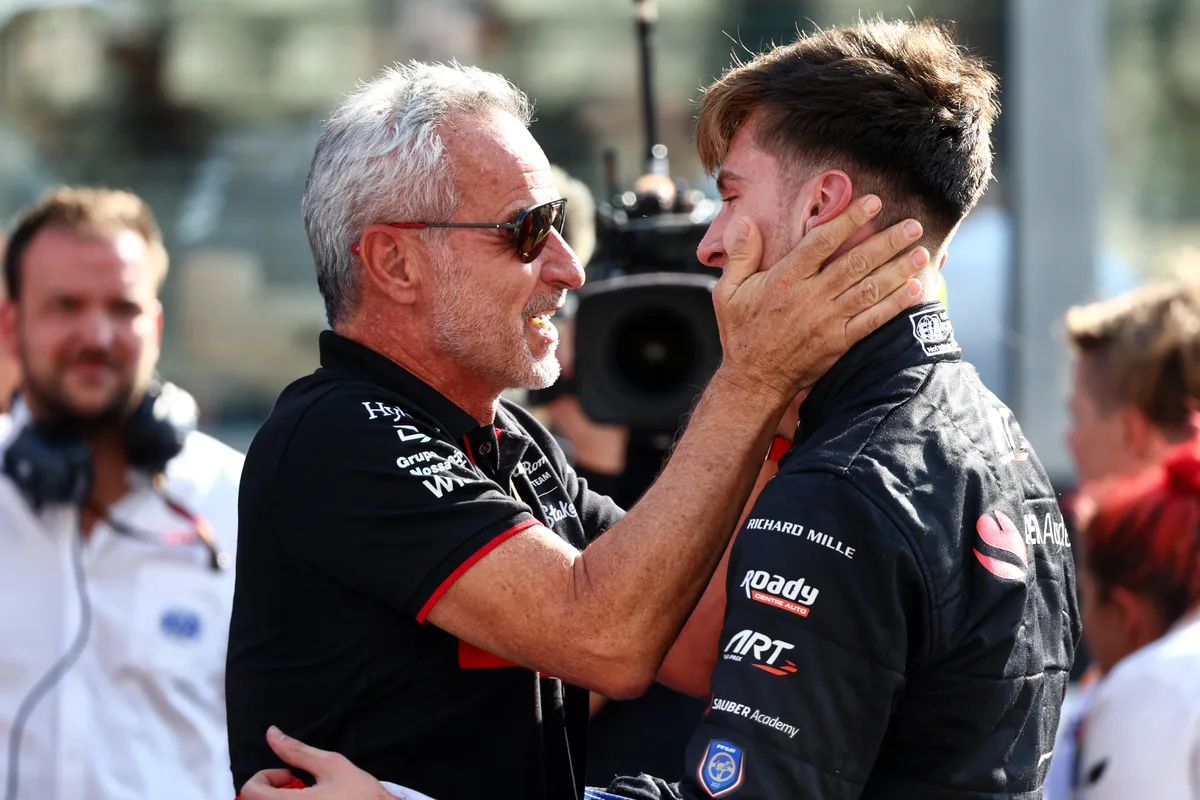 Theo Pourchaire (FRA) ART Grand Prix celebrates winning the F2 Championship in parc ferme with Beat Zehnder (SUI) Alfa Romeo F1 Sporting Director.