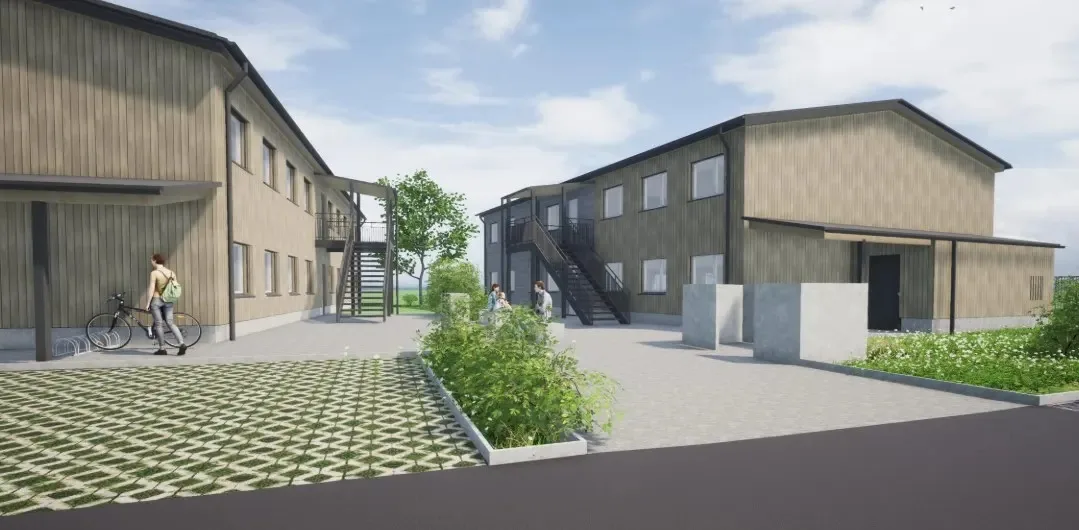 Man sieht die Visualisierung von einem Neubau.