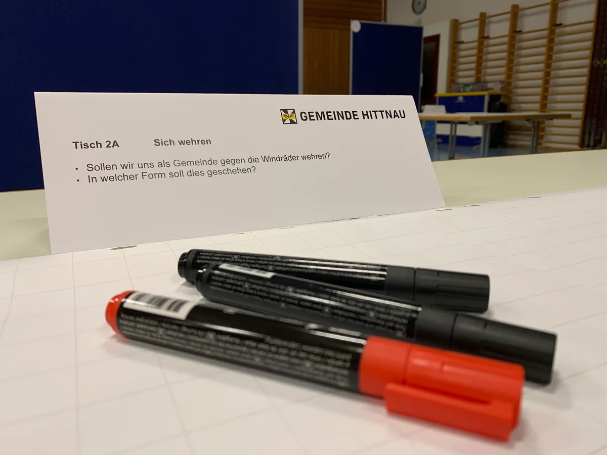 Am 11.9.2023 wird am Gemeindehöck in Hittnau über die Windenergieanlagen diskutiert. 