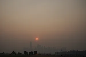 The sun rises over a hazy Manhattan skyline as seen from Jersey City, N.J., Thursday, June 8, 2023. Intense Canadian wildfires are blanketing the northeastern U.S. in a dystopian haze, turning the air acrid, the sky yellowish gray and prompting warnings for vulnerable populations to stay inside. (AP Photo/Seth Wenig) The sun rises over a hazy Manhattan skyline as seen from Jersey City, N.J., Thursday, June 8, 2023. Intense Canadian wildfires are blanketing the northeastern U.S. in a dystopian haze, turning the air acrid, the sky yellowish gray and prompting warnings for vulnerable populations to stay inside. (AP Photo/Seth Wenig)