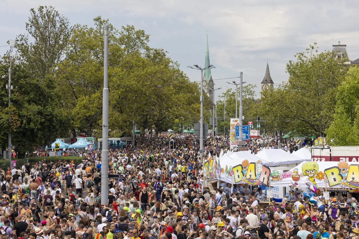 Participants are dancing through the streets during the 30th Street Parade in the city center of Zurich, Switzerland, Saturday, August 12, 2023. The annual dance music event Street Parade runs this year under the claim 