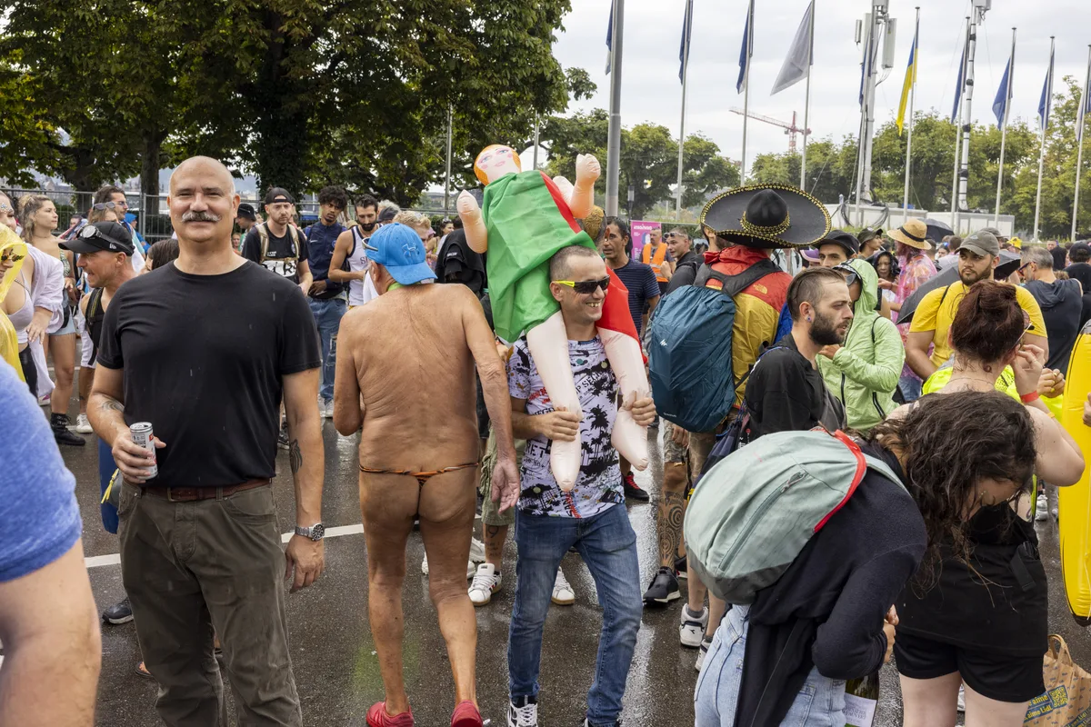 Participants are dancing through the streets during the 30th Street Parade in the city center of Zurich, Switzerland, Saturday, August 12, 2023. The annual dance music event Street Parade runs this year under the claim