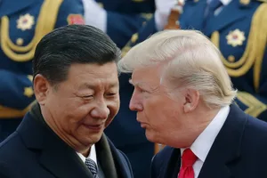 24897245-3 FILE - President Donald Trump, right, talks with China's President Xi Jinping during a welcome ceremony at the Great Hall of the People in Beijing, Nov. 9, 2017. (AP Photo/Andy Wong, File)
Donald Trump, Xi Jinping