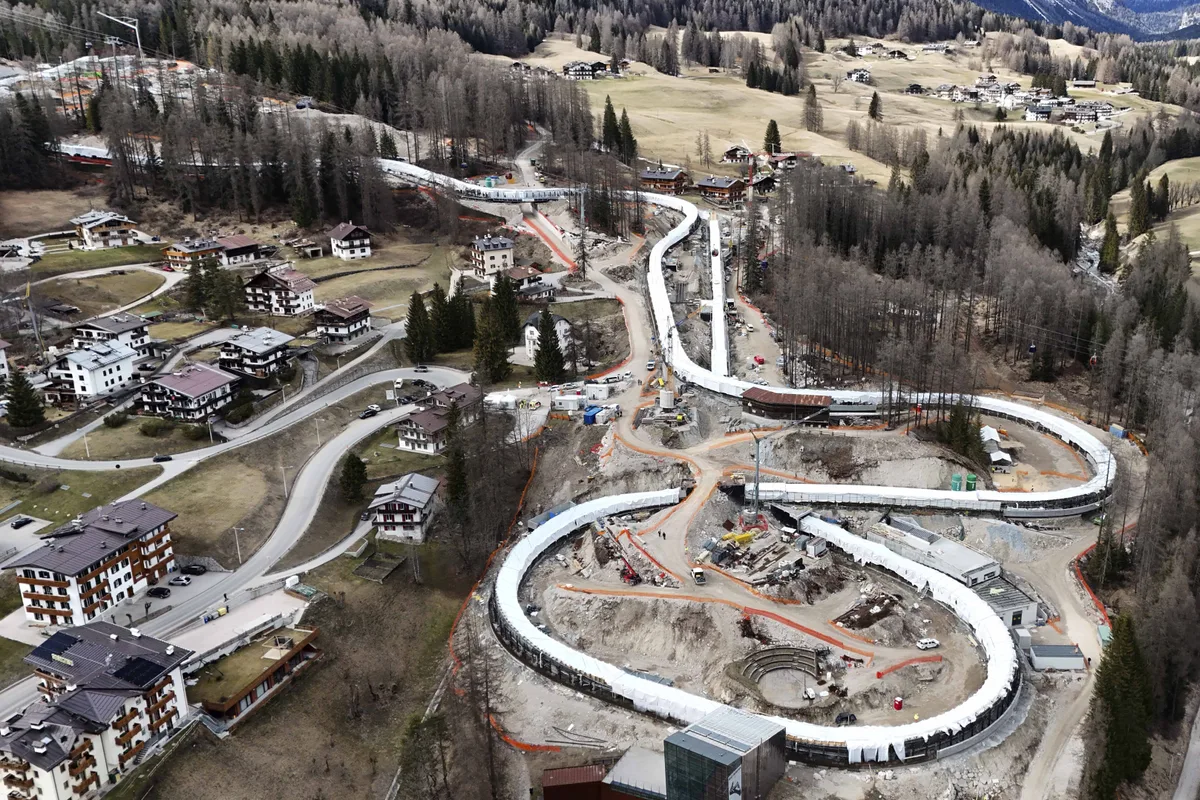 Construction work takes place at the Cortina Sliding Center, venue for the bob, luge and skeleton disciplines at the Milan Cortina 2026 Winter Olympics, in Cortina D'Ampezzo, Italy, Tuesday, March 25, 2025.