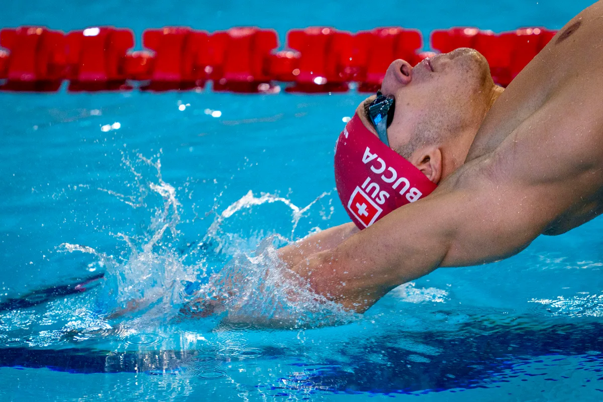 Swiss Swimmer Flavio Bucca competes in the Men’s 100m Backstroke Heats during the European Aquatics Short Course Swimming Championships in Lublin, Poland, Thursday, Dec. 4, 2025. (KEYSTONE/Patrick B. Kraemer)